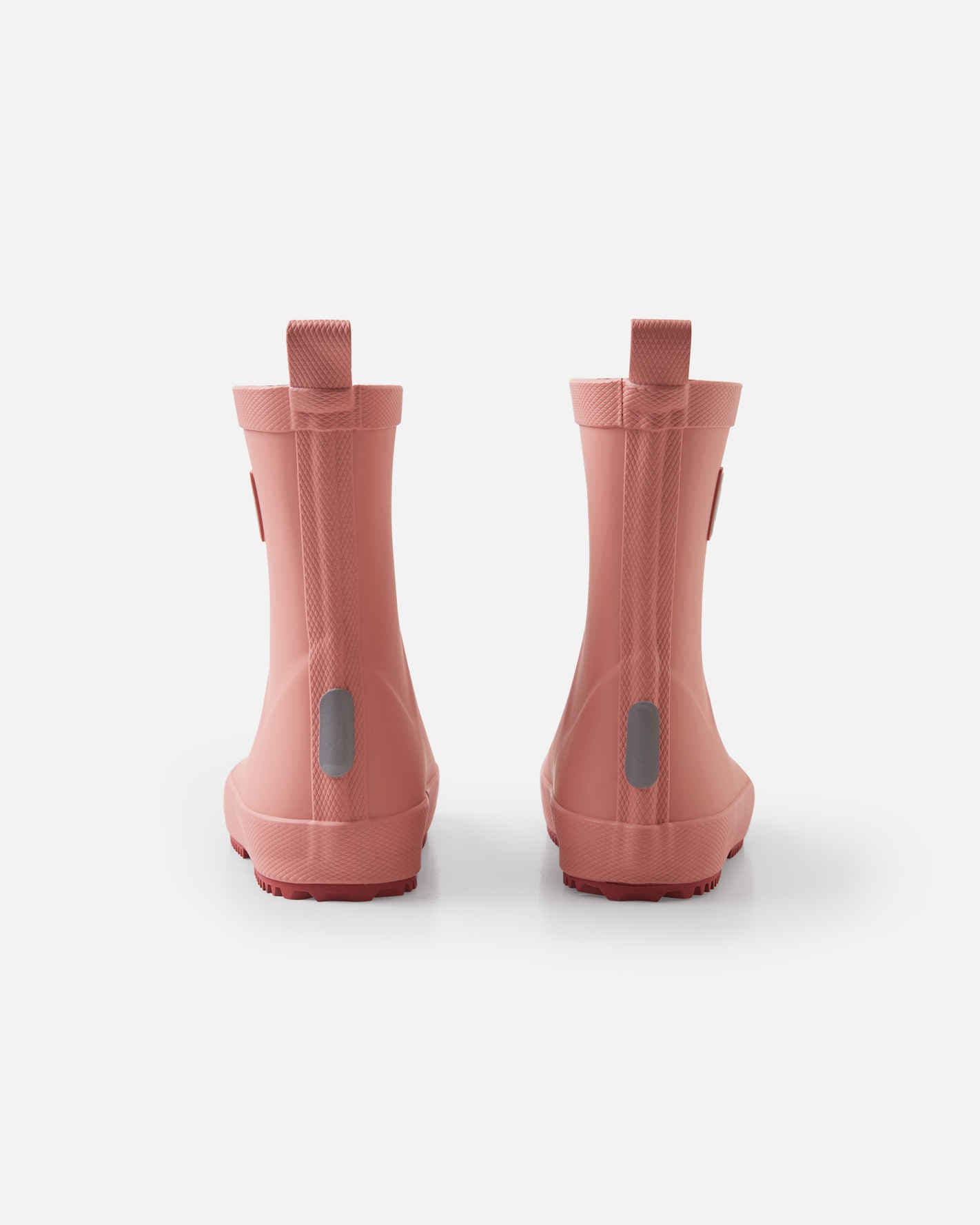 Reima paljasjalkakumisaapas rose blush sävyssä takaa kuvattuna
